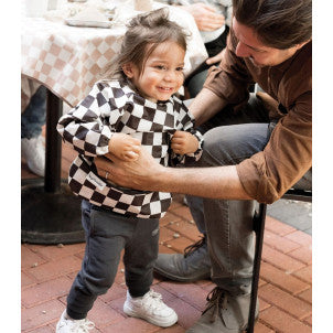 Babero impermeable c/mangas cuadros negro t-l tiny twinkle 2