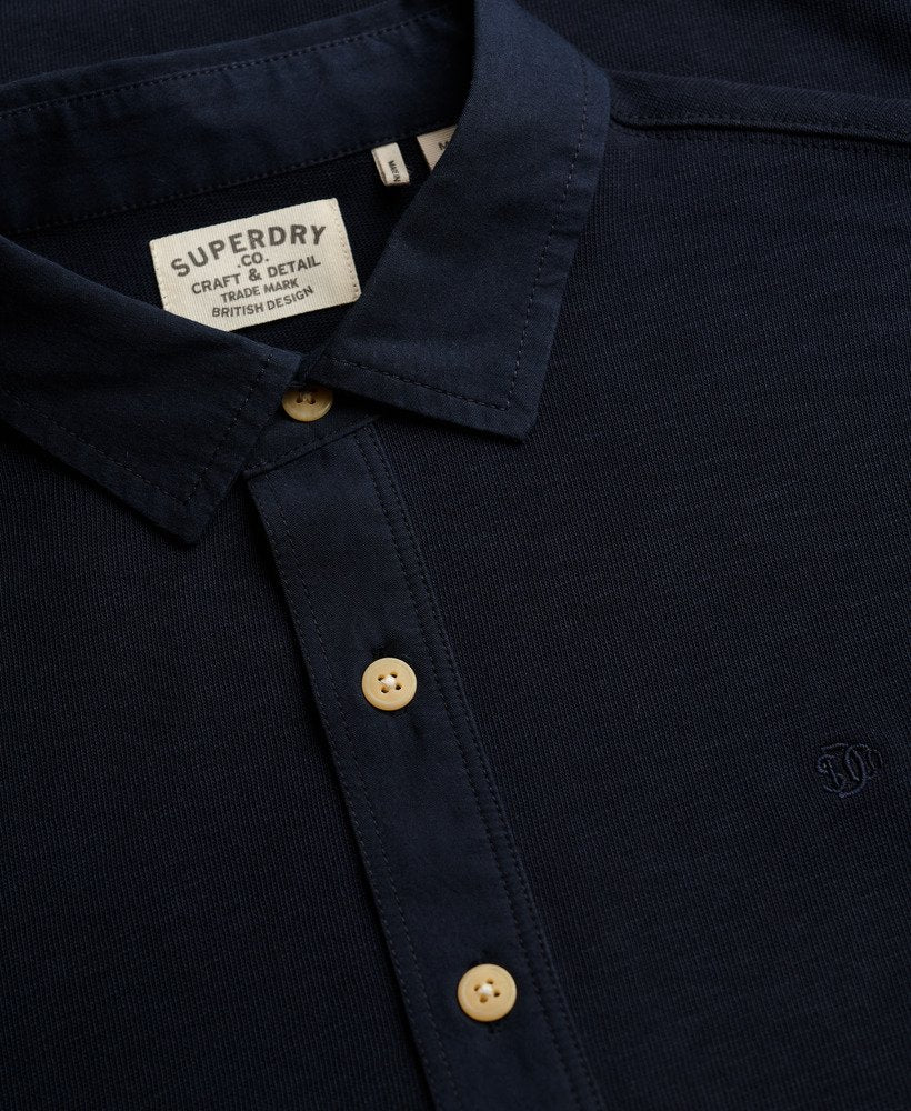Polo clásico de manga larga estilo preppy azul marino intenso Superdry&Co