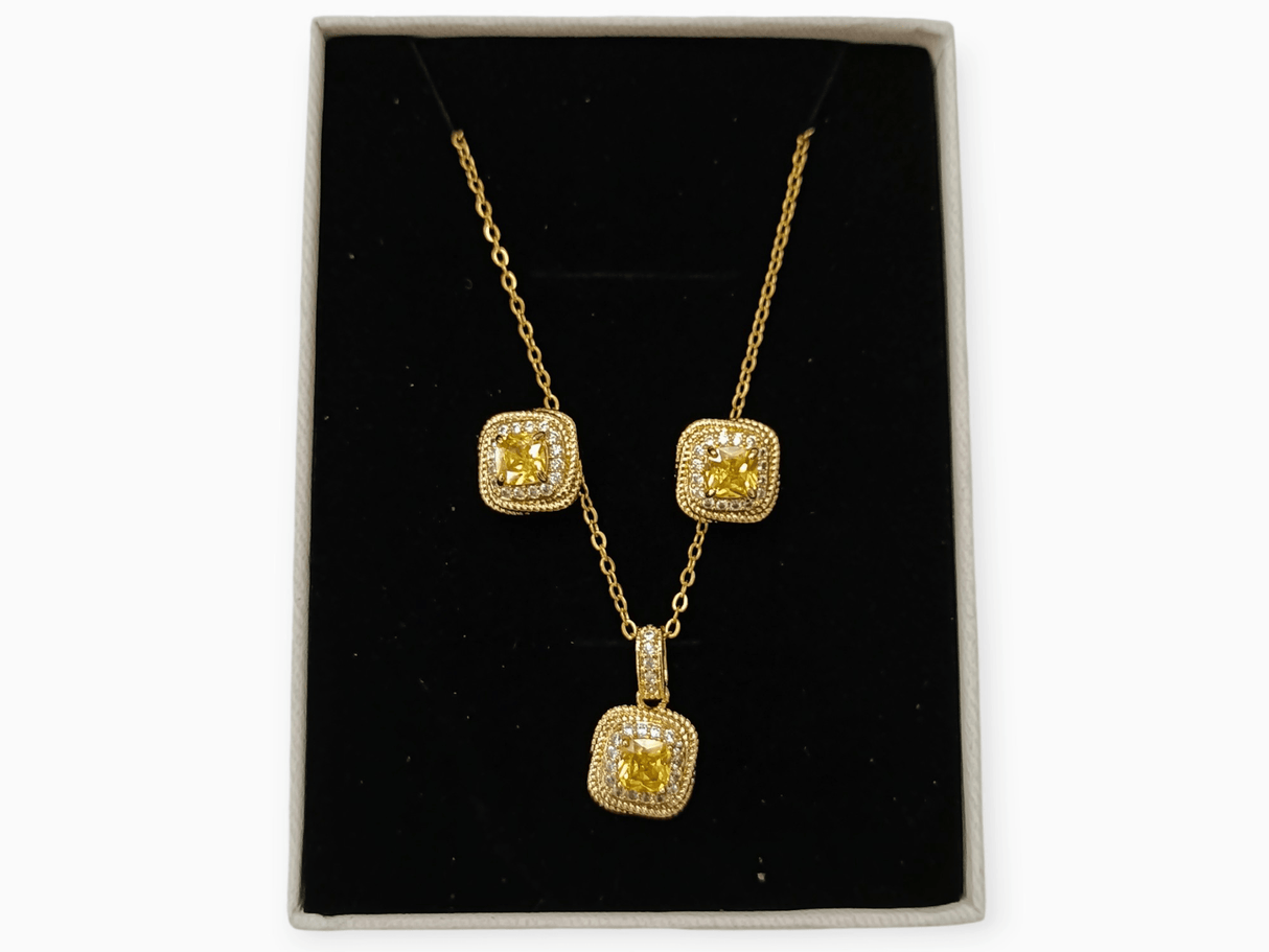 Conjunto acero circonita amarilla 1