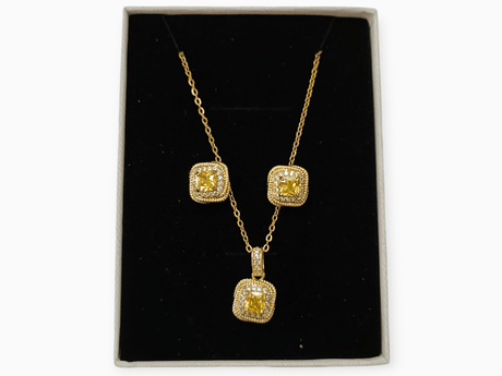 Conjunto acero circonita amarilla 1