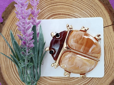 Broche mariquita marrón 1