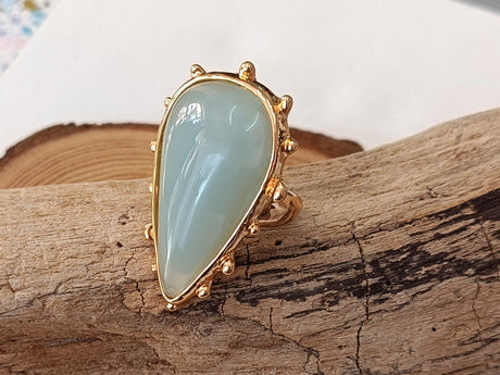 Anillo dorado lágrima turquesa 1