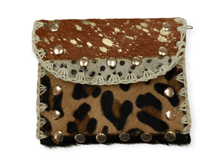 Monedero de piel con pelo de potro animal print marrón 1