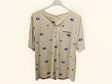 Camiseta Beigue con botones estampado flores 1
