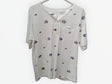 Camiseta blanca con botones estampado flores 1