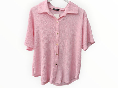 Camiseta con botones manga corta rosa 1