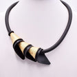 Collar caucho y dorado 1