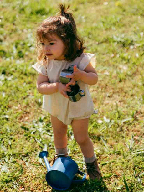 BODIE BEIGE SIN MANGAS BEBÉ NIÑA SNUG 1