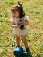 BODIE BEIGE SIN MANGAS BEBÉ NIÑA SNUG 1