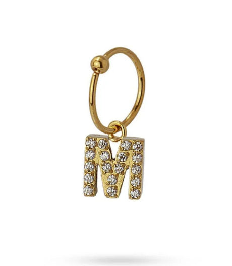 Piercing letra m dorado anartxy 1