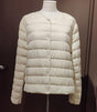 Chaqueta corta plumas beige gus 1