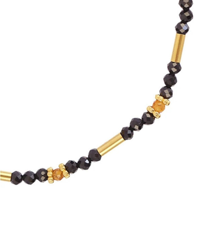 Pulsera tubos dorados negro anartxy 2