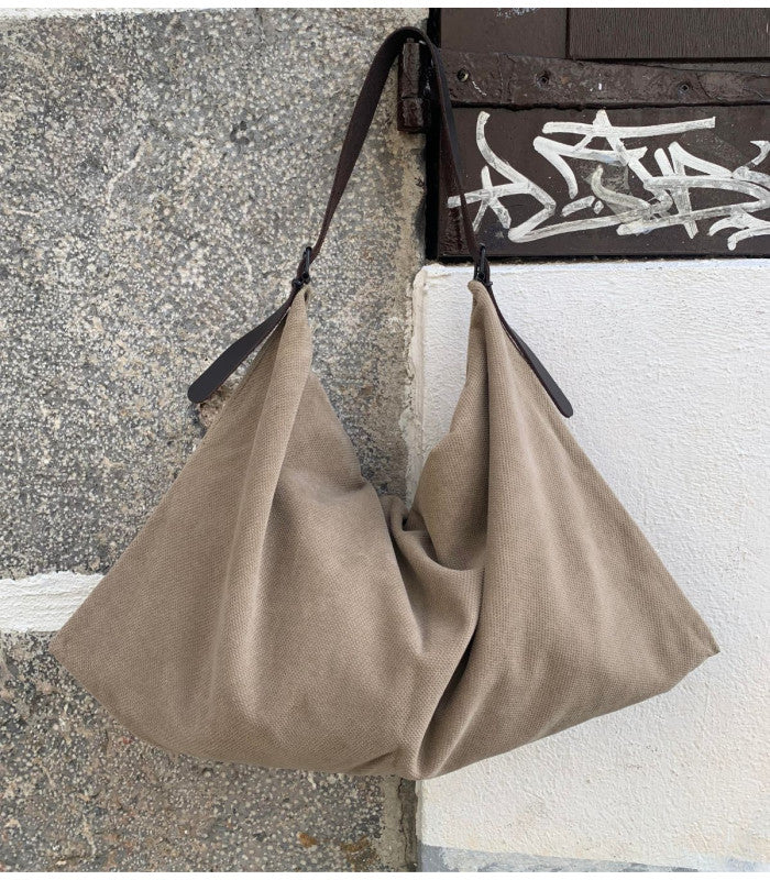 Bolso trapecio beige skandal 1