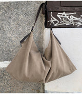 Bolso trapecio beige skandal 1