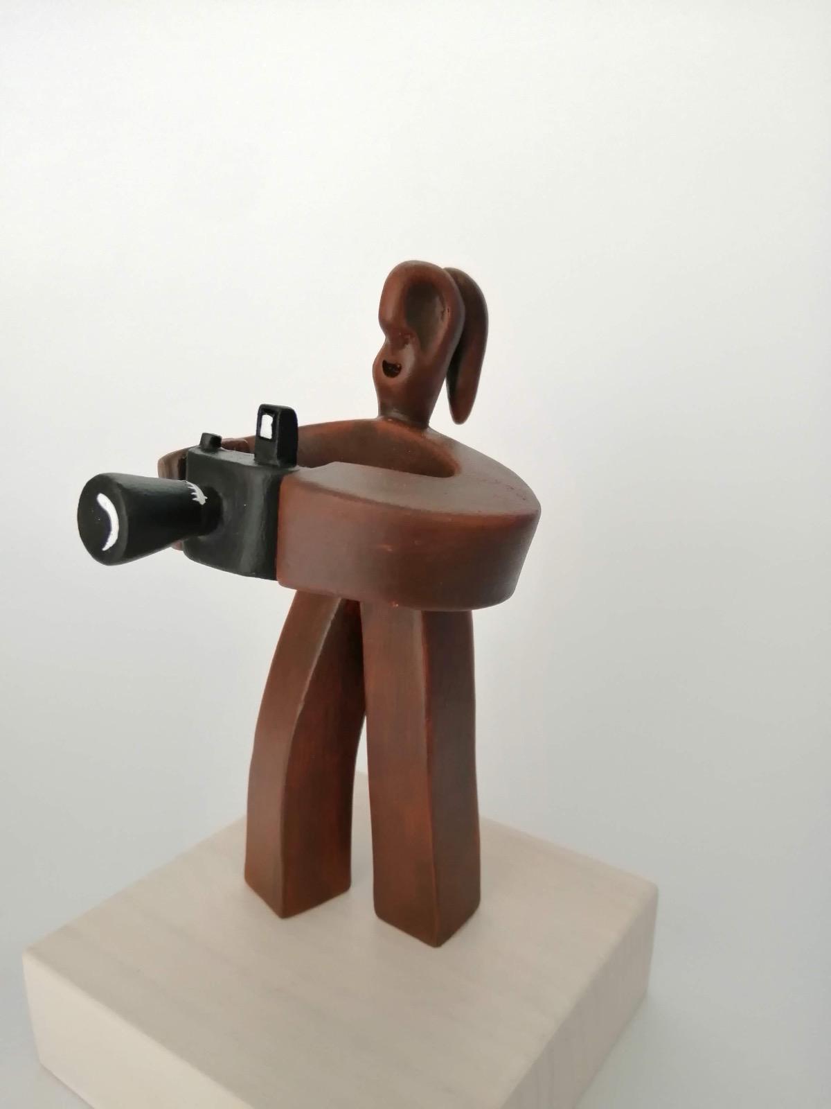 Figura Fotógrafa - Dendago