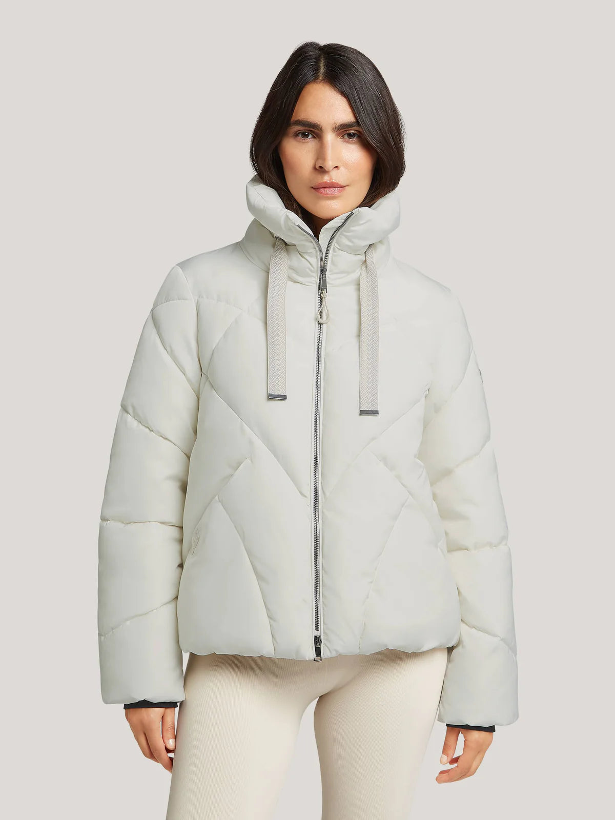 PLUMIFERO CORTO RESET 1