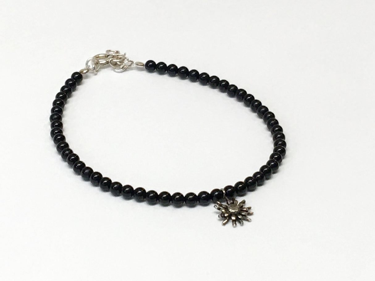 PULSERA BOLITAS ONIX CON EGUZKILORE PLATA - Dendago