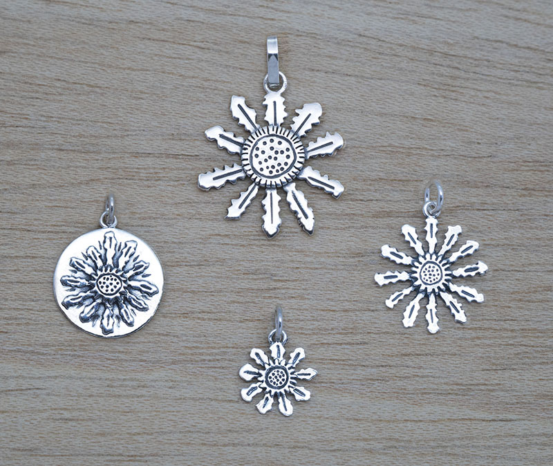 Producto vasco colgante EGUZKILORE de plata ZIRCONIA mitología vasca artesanía TXUS GRUZETA