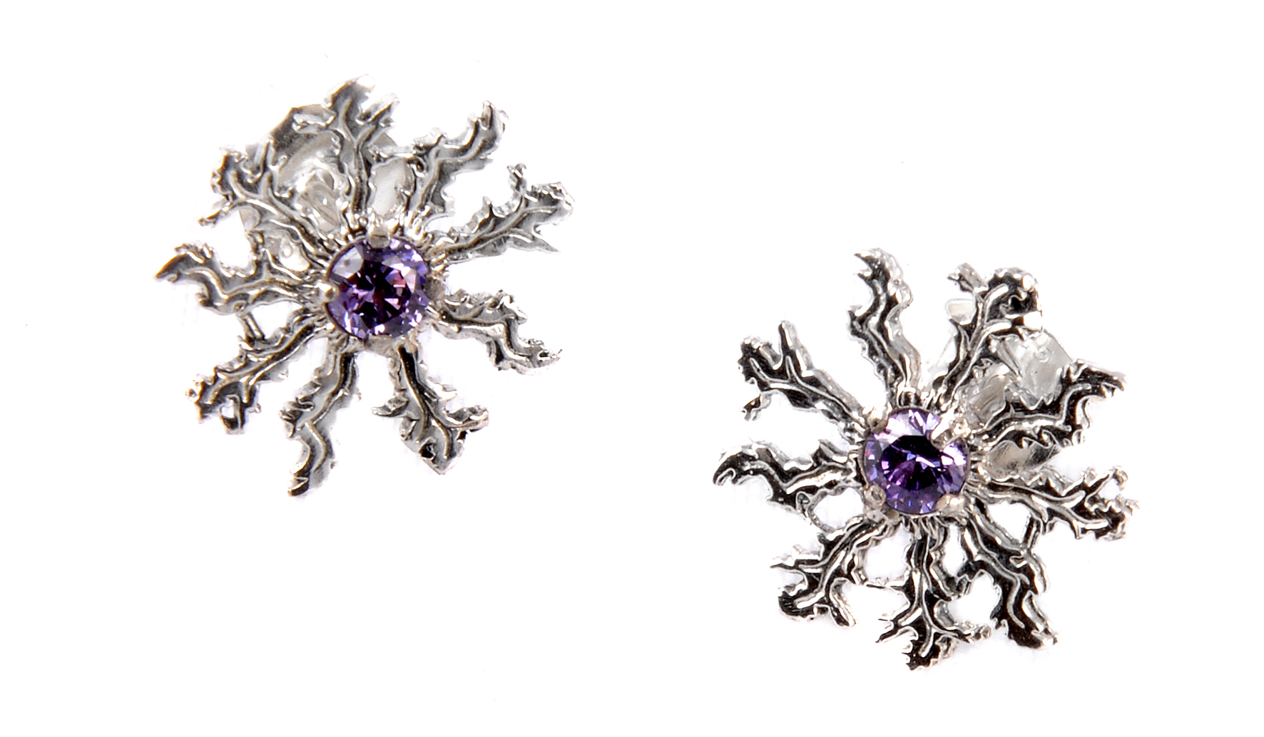 Producto vasco Eguzkilore plata,pendiente circonita morada