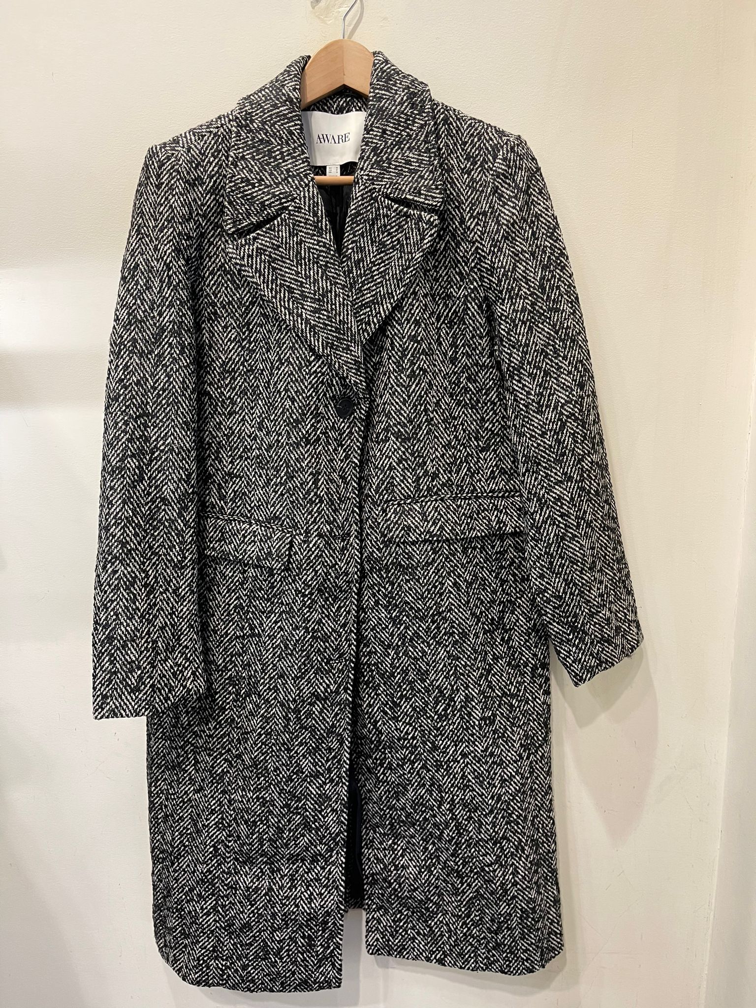 Abrigo negro jaspeado